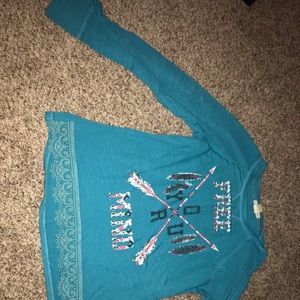 Free your mind turquoise long sleeve shirt.